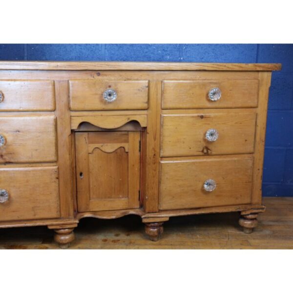 A Victorian Waxed Pine Farmhouse Dresser Raised on Turned Feet - Image 2