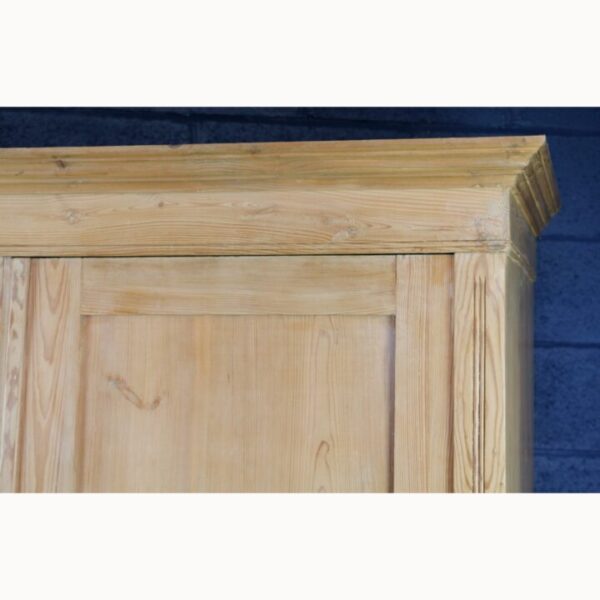 An Antique Rustic Farmhouse Pine Double Wardrobe Raised on Bun Feet - Image 2