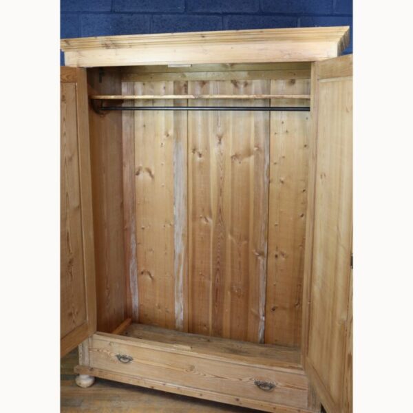 An Antique Rustic Farmhouse Pine Double Wardrobe Raised on Bun Feet - Image 5