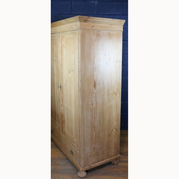 An Antique Rustic Farmhouse Pine Double Wardrobe Raised on Bun Feet - Image 3