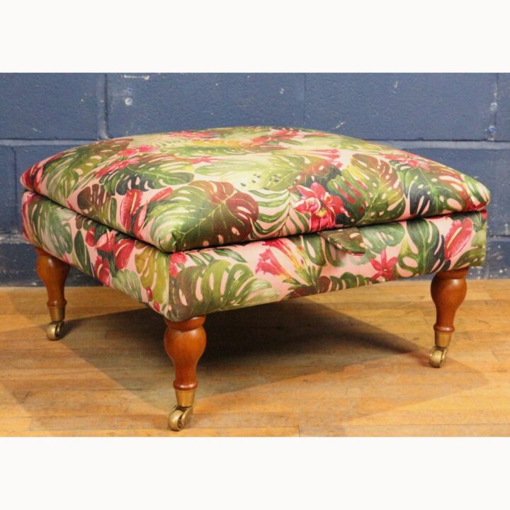 A Large Square Footstool or Ottoman with Storage, Reupholstered in Stylised Material Raised on Turned Supports