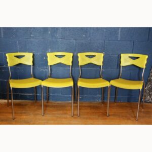A Vintage Set of Four Dario Delpin Effezeta Milu Yellow Plastic & Chrome Dining Chairs