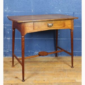 An Art Nouveau Oak Single Drawer Hall or Side Table Raised on Turned Angled Supports