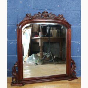 A Victorian Style Carved Mahogany Bevel Edged Overmantle Mirror