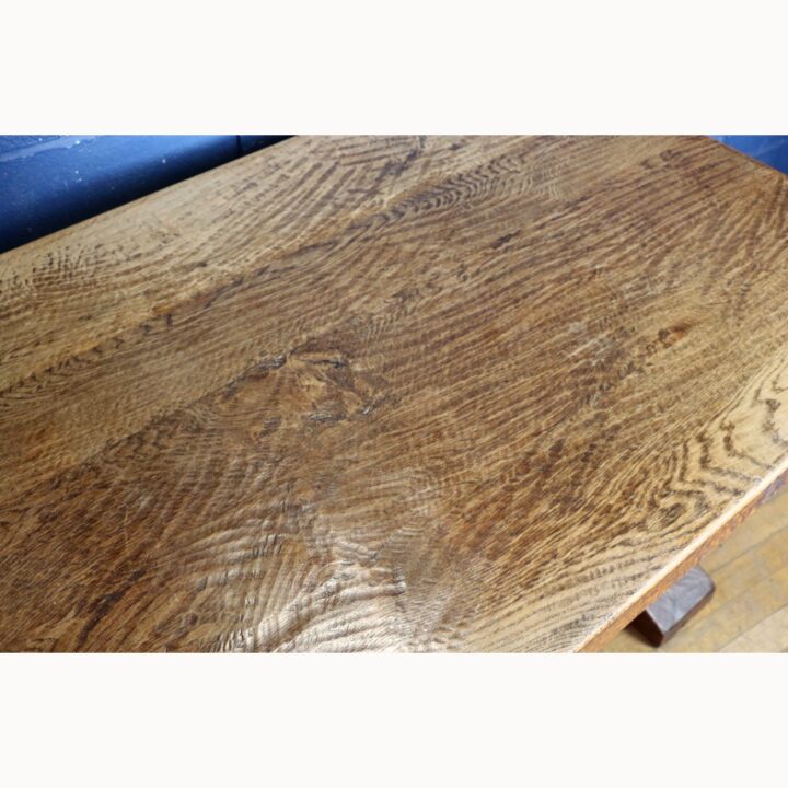 A Rustic Solid Oak Trestle Dining Table along with Set of Four Ladder Back Rush Seat Dining Chairs - Image 12