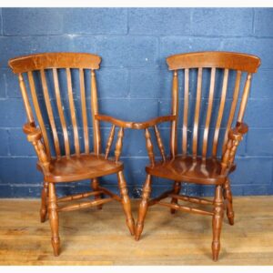 A Vintage Ash Slatback Kitchen Arm Chair Raised on Turned Supports