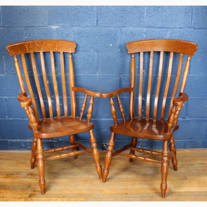A Vintage Ash Slatback Kitchen Arm Chair Raised on Turned Supports
