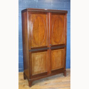 An Edwardian Carved Mahogany Two Door Wardrobe