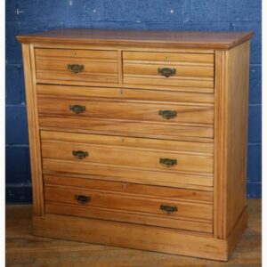 A Victorian Satinwood Two over Three Chest of Drawers