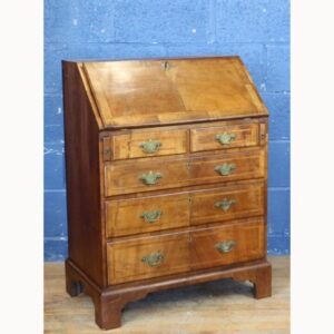 An Antique Queen Anne Walnut Bureau with Fitted Interior
