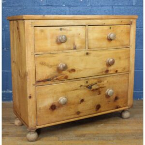 A Victorian Farmhouse Waxed Pine Two over Two Chest of Drawers