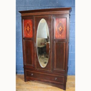 A Victorian Inlaid Mahogany Mirror Fronted Single Door Wardrobe