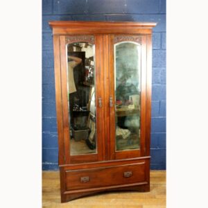 A Victorian Carved Walnut Mirror Fronted Double Wardrobe
