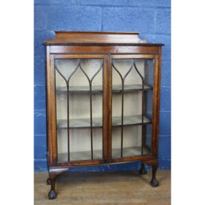 A 1930s Carved Oak Bow Fronted Astrical Glazed Two Door China Cabinet